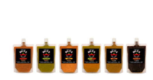 Set of six bottles with labels on a white background