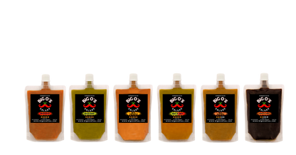 Set of six bottles with labels on a white background